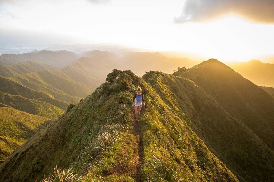 Group of hikers enjoying mountain summit view